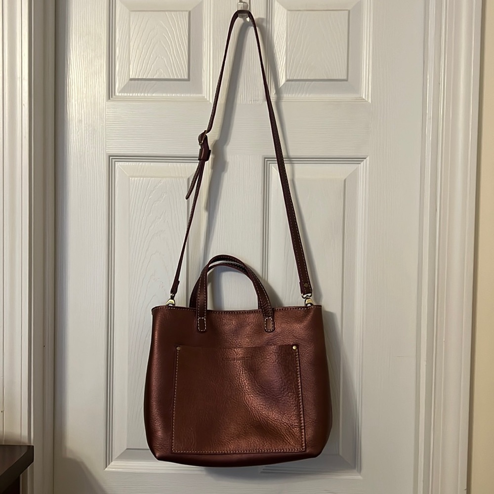 Portland Leather Medium zippered crossbody tote. Metallic plum color.